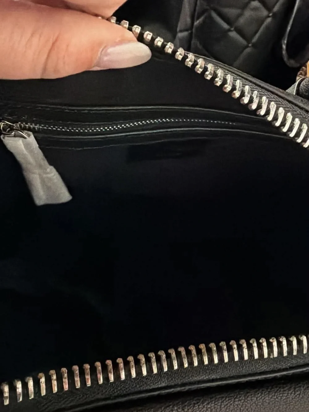 Black leather bag with strap